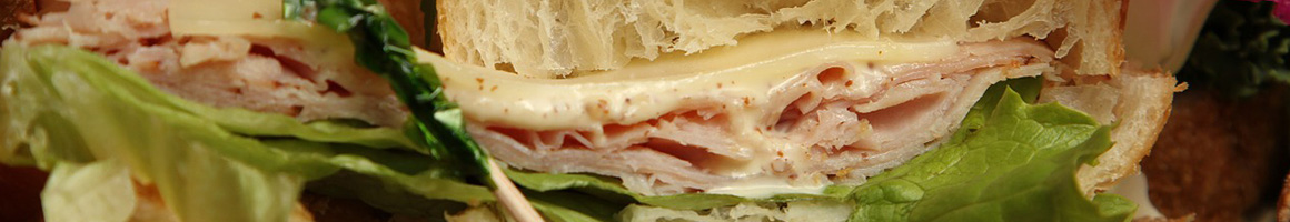 Eating Deli Sandwich at AUBURN restaurant in Auburn, AL.